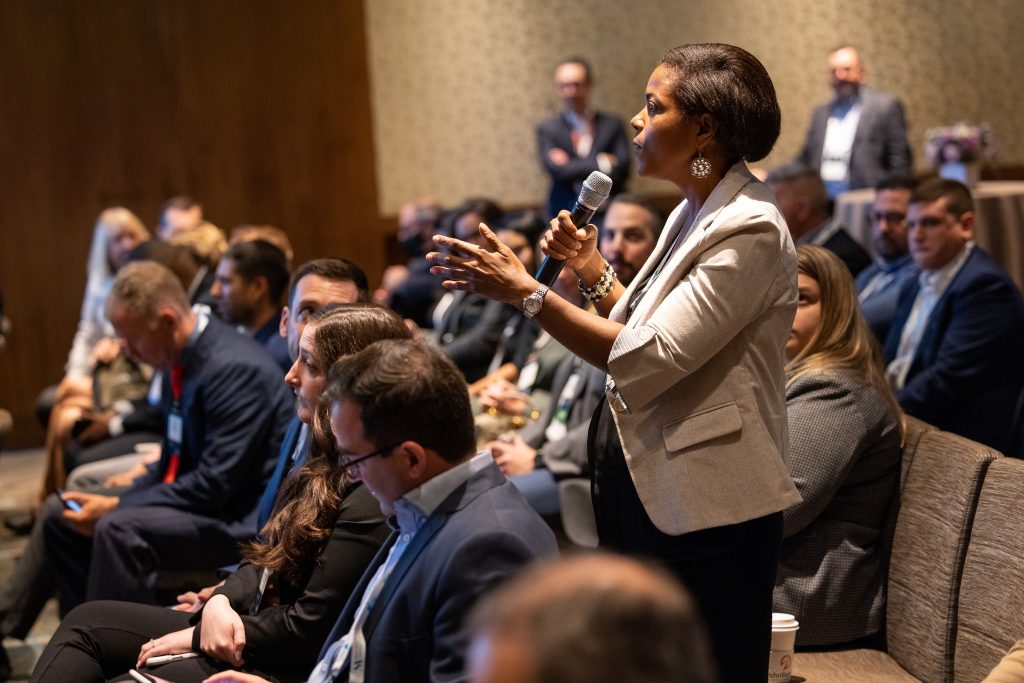 Photo of a member asking a question at the Q&A at the DE&I Session at TMA Annual Conference